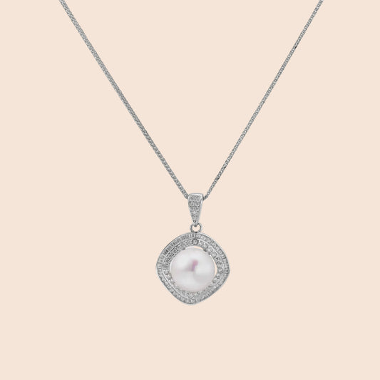 Cushion-shaped double halo pendant with 10mm freshwater pearl center on rhodium-plated sterling silver chain