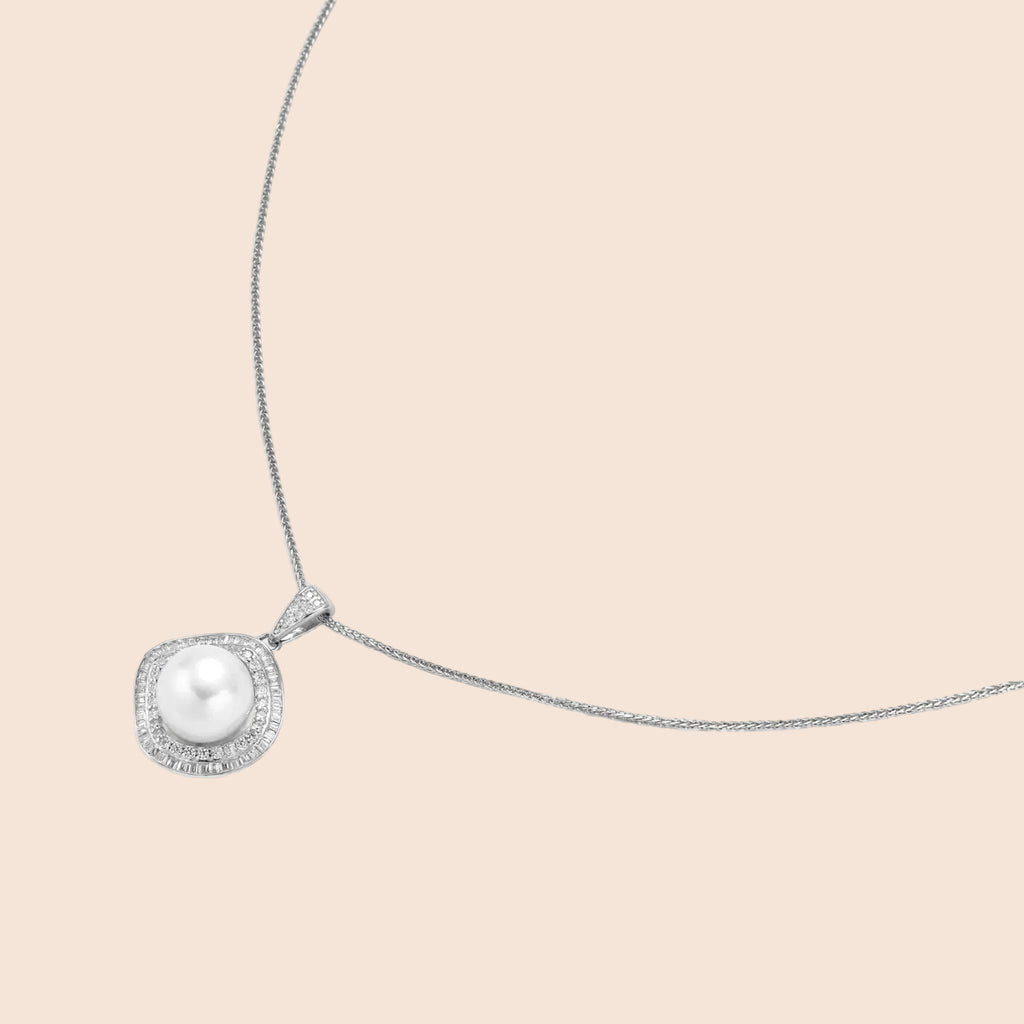 Cushion-shaped double halo pendant with 10mm freshwater pearl center on rhodium-plated sterling silver chain