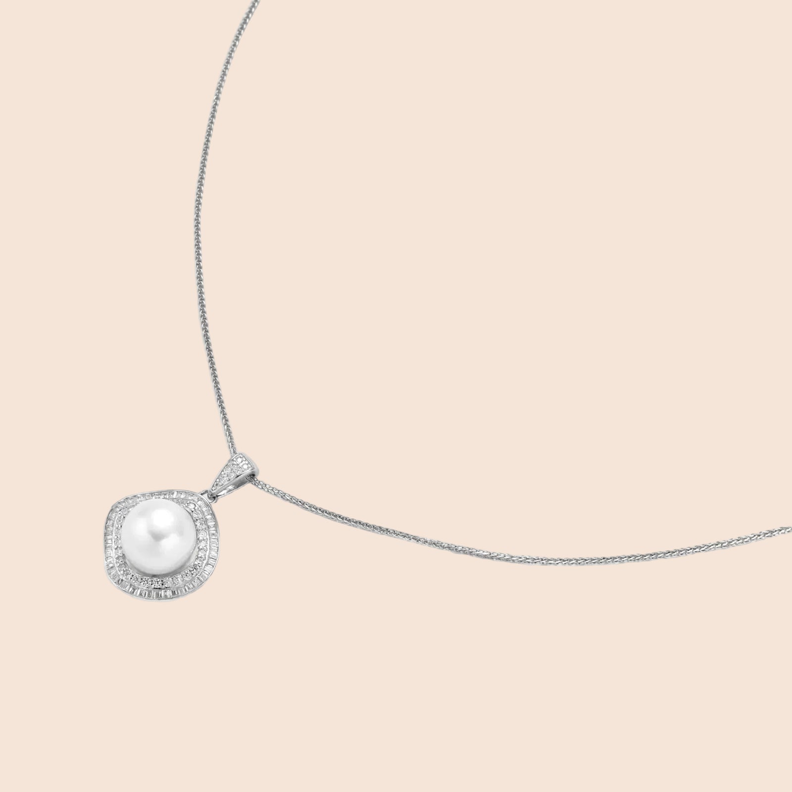 Cushion-shaped double halo pendant with 10mm freshwater pearl center on rhodium-plated sterling silver chain