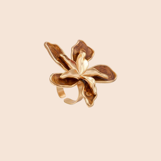 Large rose gold ring with marbled brown enamel petals in a sculptural flower design