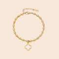18K gold-plated oval bead chain bracelet with quatrefoil clover charm featuring mother of pearl inlay on cream background