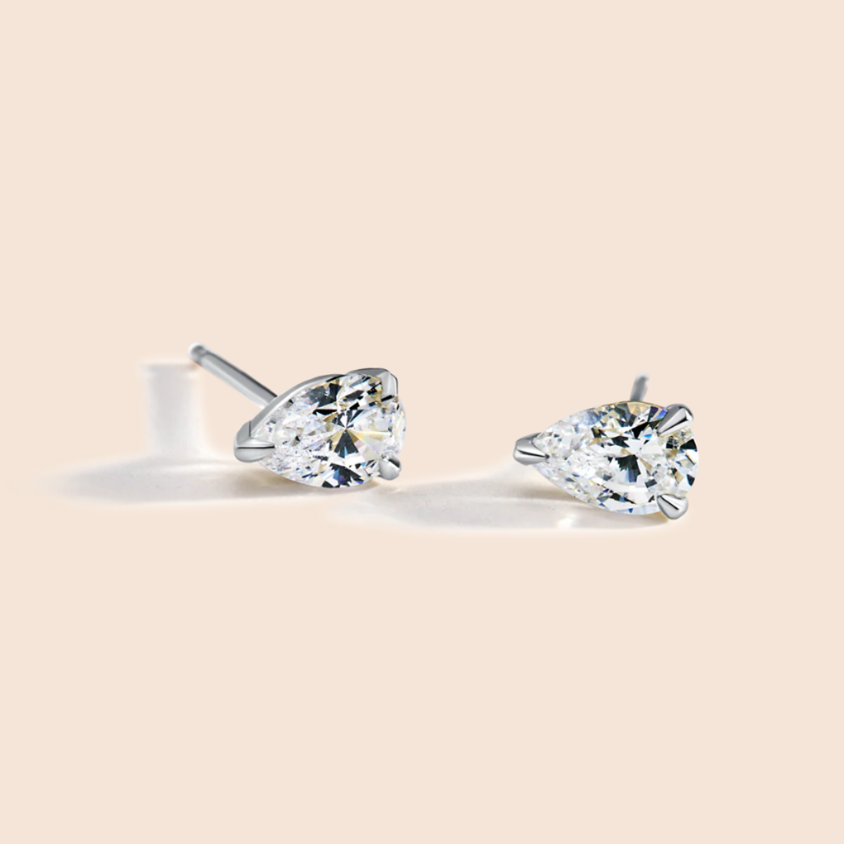 14K White Gold Platinum Pear Studs